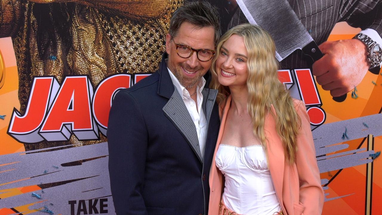 Dan Bucatinsky and Katie Baker attend the red carpet world premiere of Jackpot!