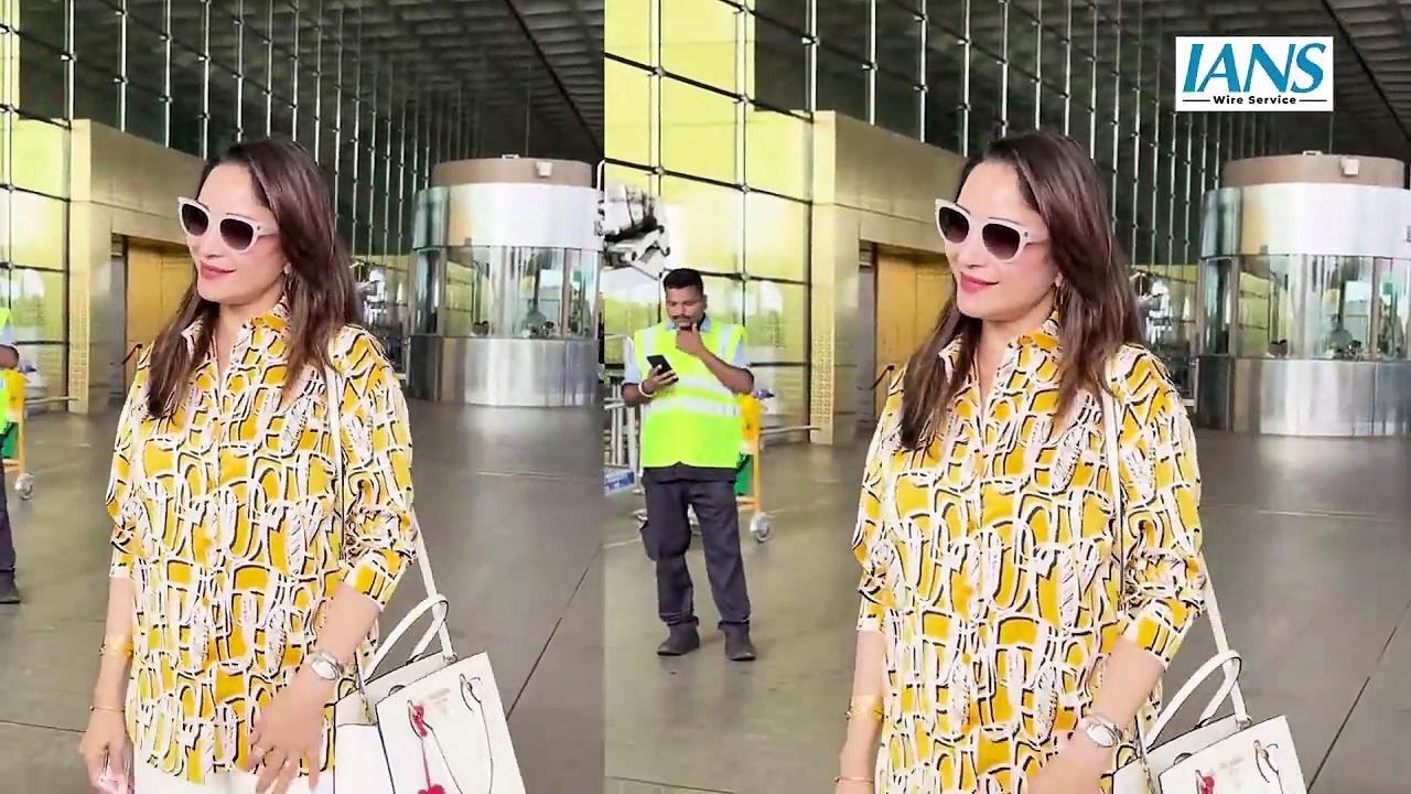 Madhuri Dixit Steps Out in Style Wearing Yellow Printed Shirt and White Pants