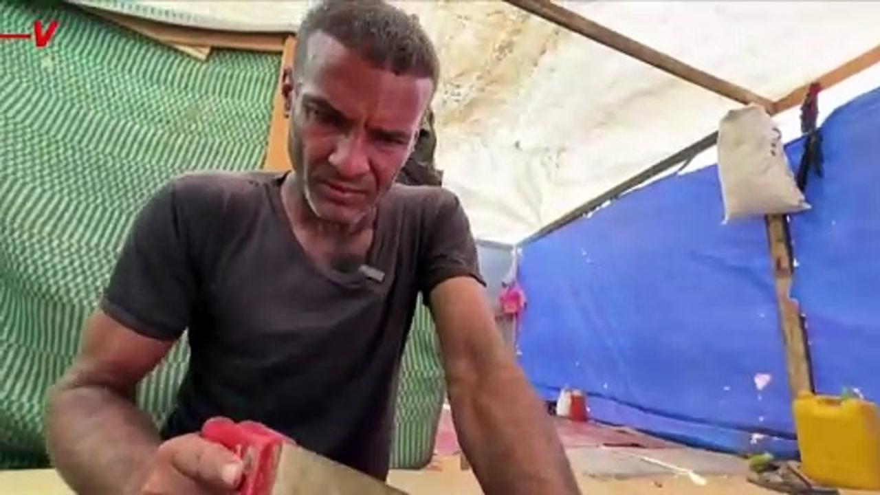 Amid Gaza Crisis, Displaced Father Crafts Wooden Sandals for Daughters as Footwear Shortage Intensifies