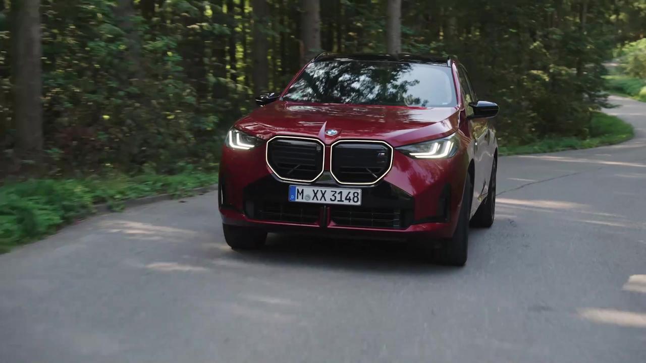 The new BMW X3 M50 xDrive in Fire Red Driving Video