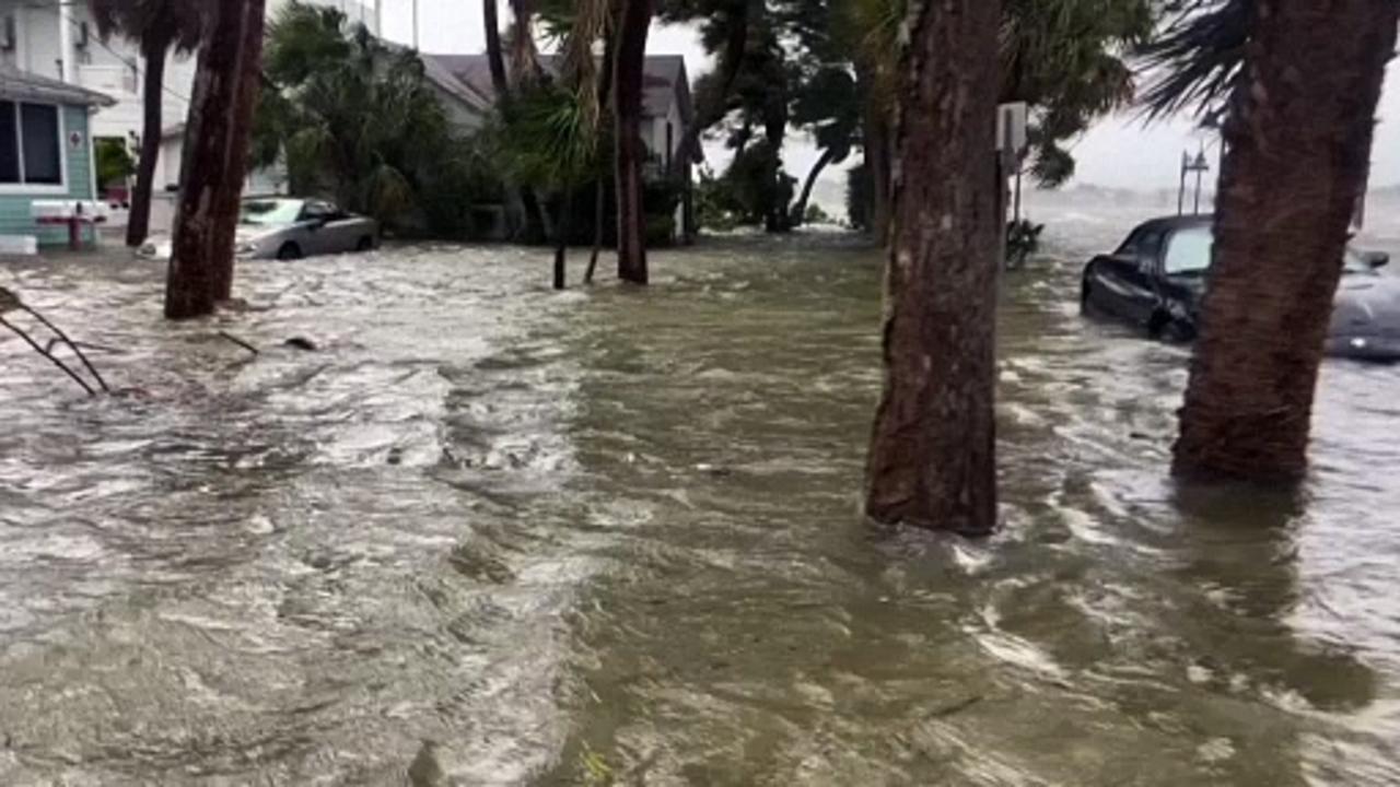 Cars, houses submerged after floods caused by hurricane in Florida