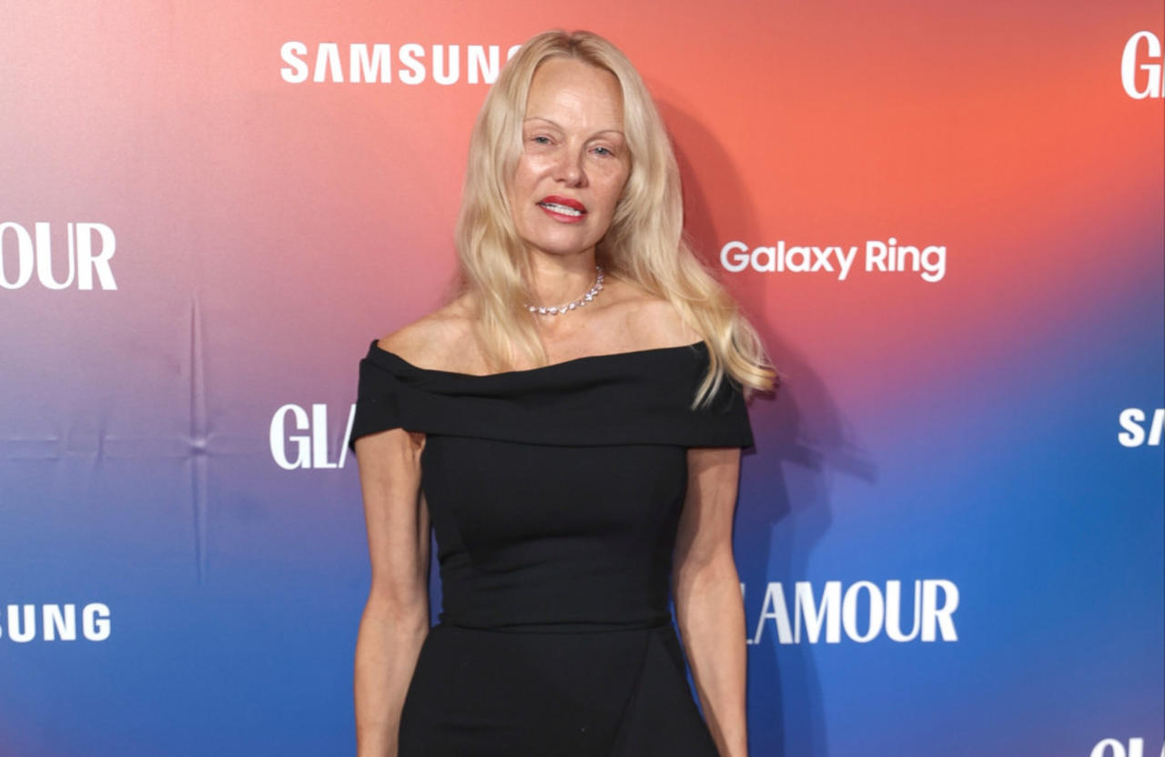 Pamela Anderson dedicated her Glamour Women of the Year Awards trophy to women 'everywhere' who have risen above pain