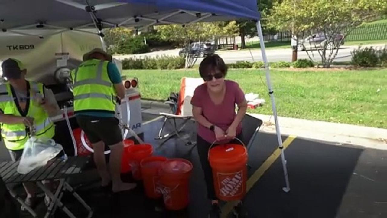 Residents queue for water as North Carolina starts to rebuild after hurricane