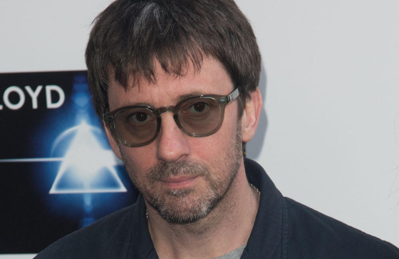 Blur guitarist Graham Coxon is pleased that Oasis are reuniting