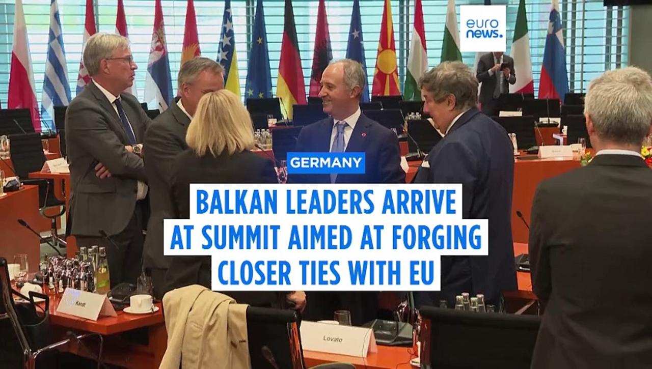 Western Balkan heads of state arrive in Berlin for summit aimed at forging closer ties with EU