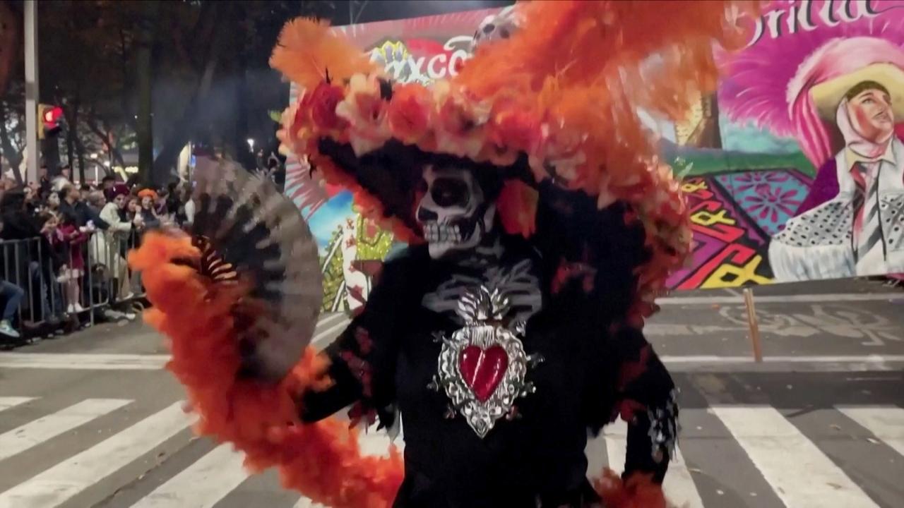 Hundreds of Skeletons Parade Through Mexico City to Celebrate Day of the Dead