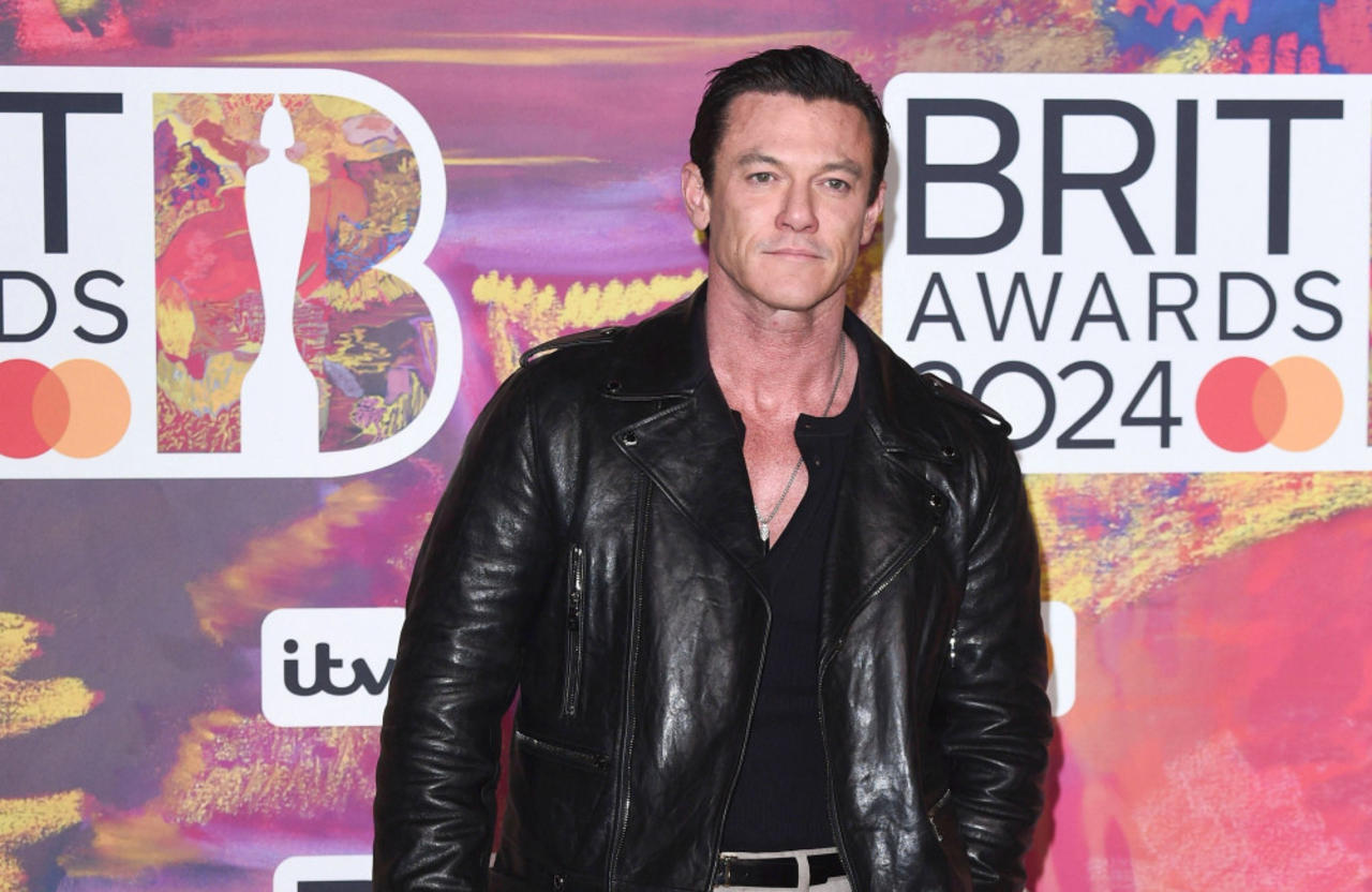 Luke Evans' faith made him think being gay would be a 'death sentence'