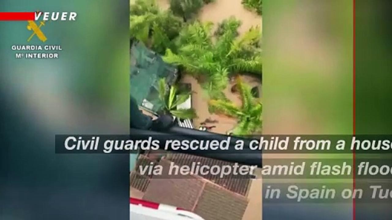 Helicopter Rescues Child From House In Flood-Hit Spain