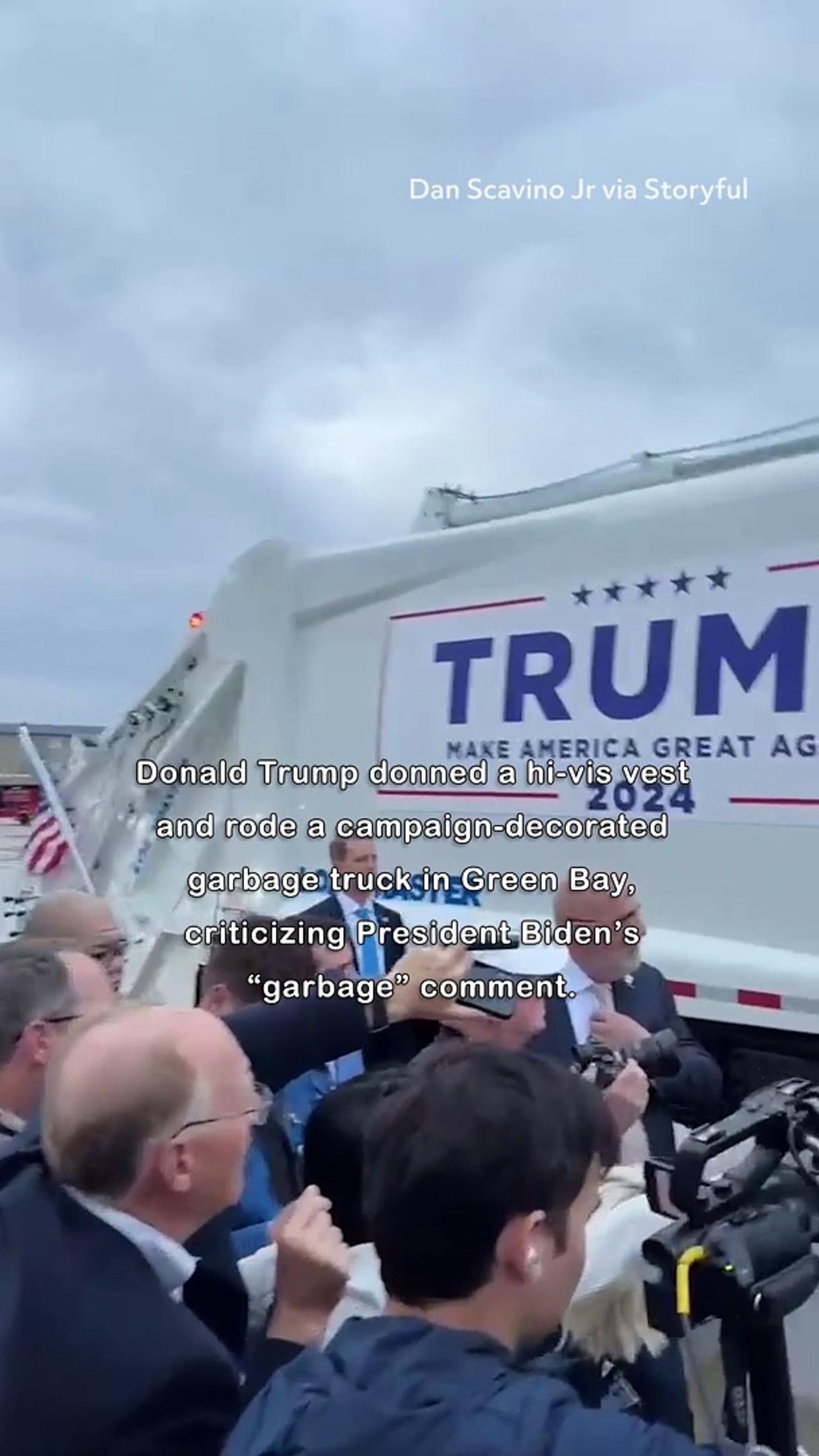 Trump Wears Orange Vest and Rides Garbage Truck Ahead of Rally