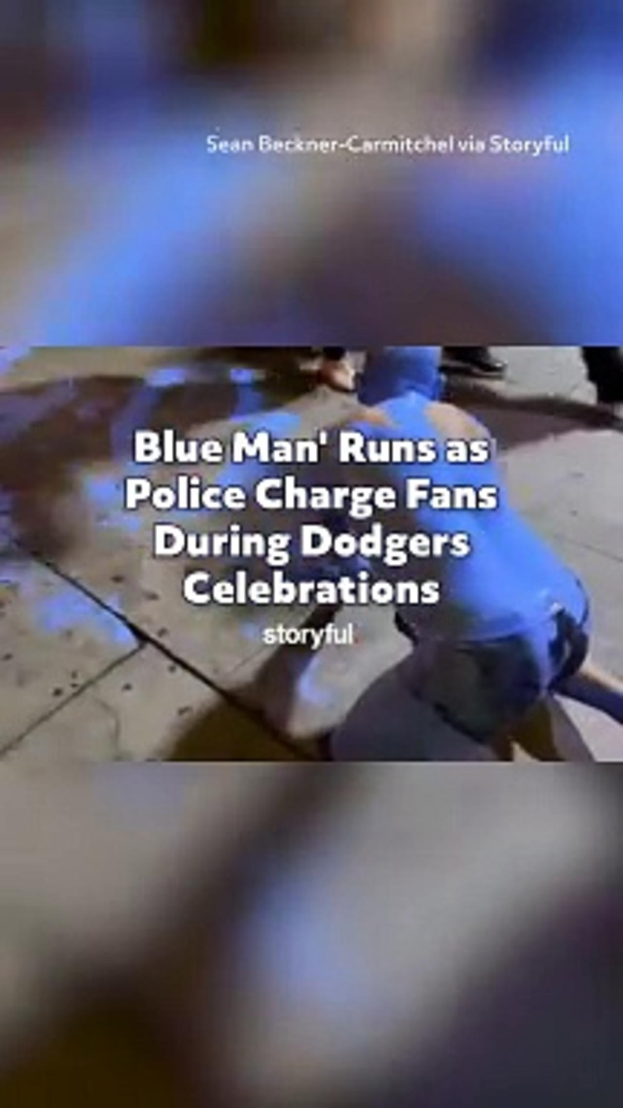 Blue Man' Runs as Police Charge Fans During Dodgers Celebrations