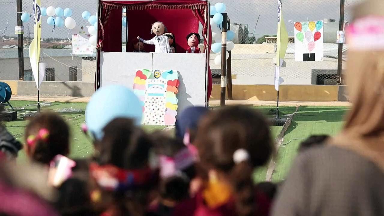 Educational puppet show brings 'smiles and joy' to children in northwest Syria