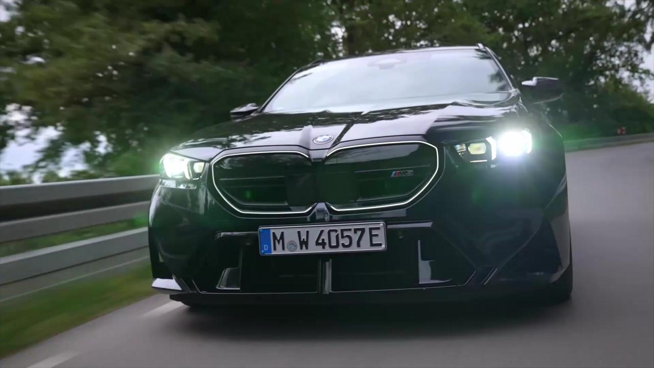 The all-new BMW M5 Touring in Carbon Black Driving Video