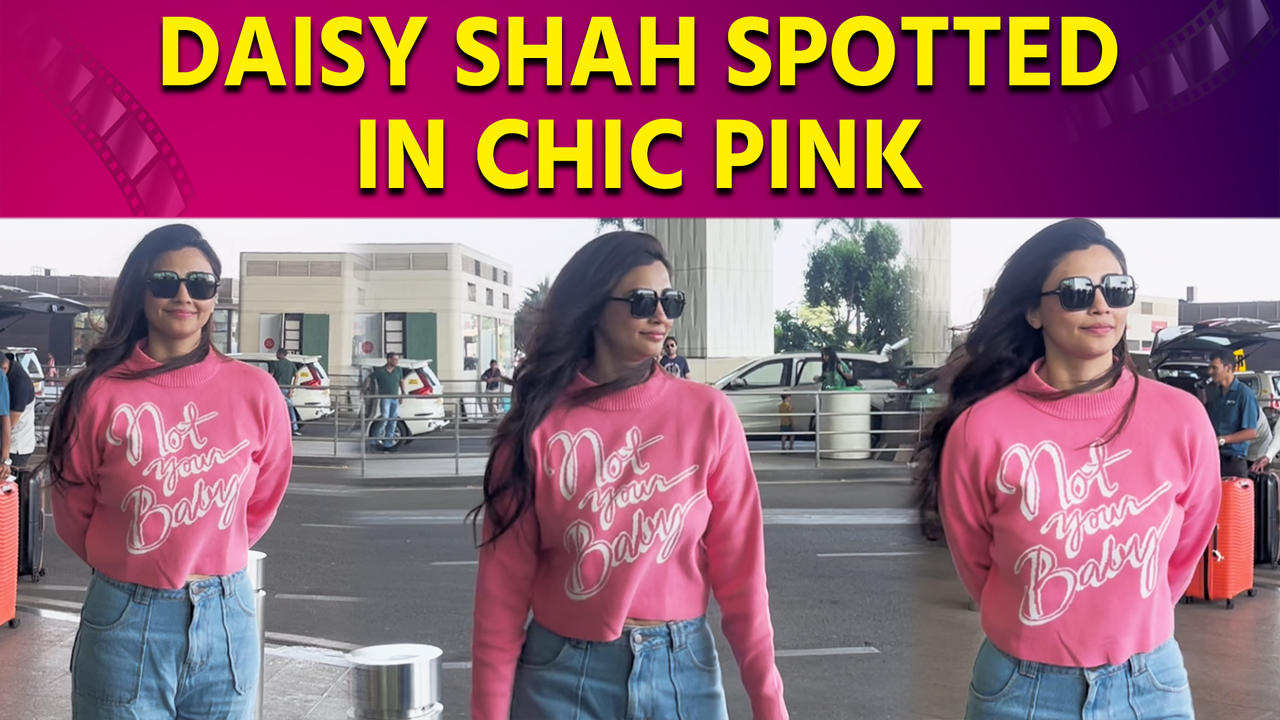 Daisy Shah Rocks ‘Not Your Baby’ Sweater Top at Airport