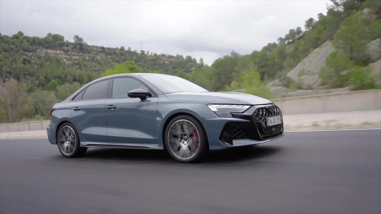 The new Audi RS 3 Sedan in Kemora gray Driving Video