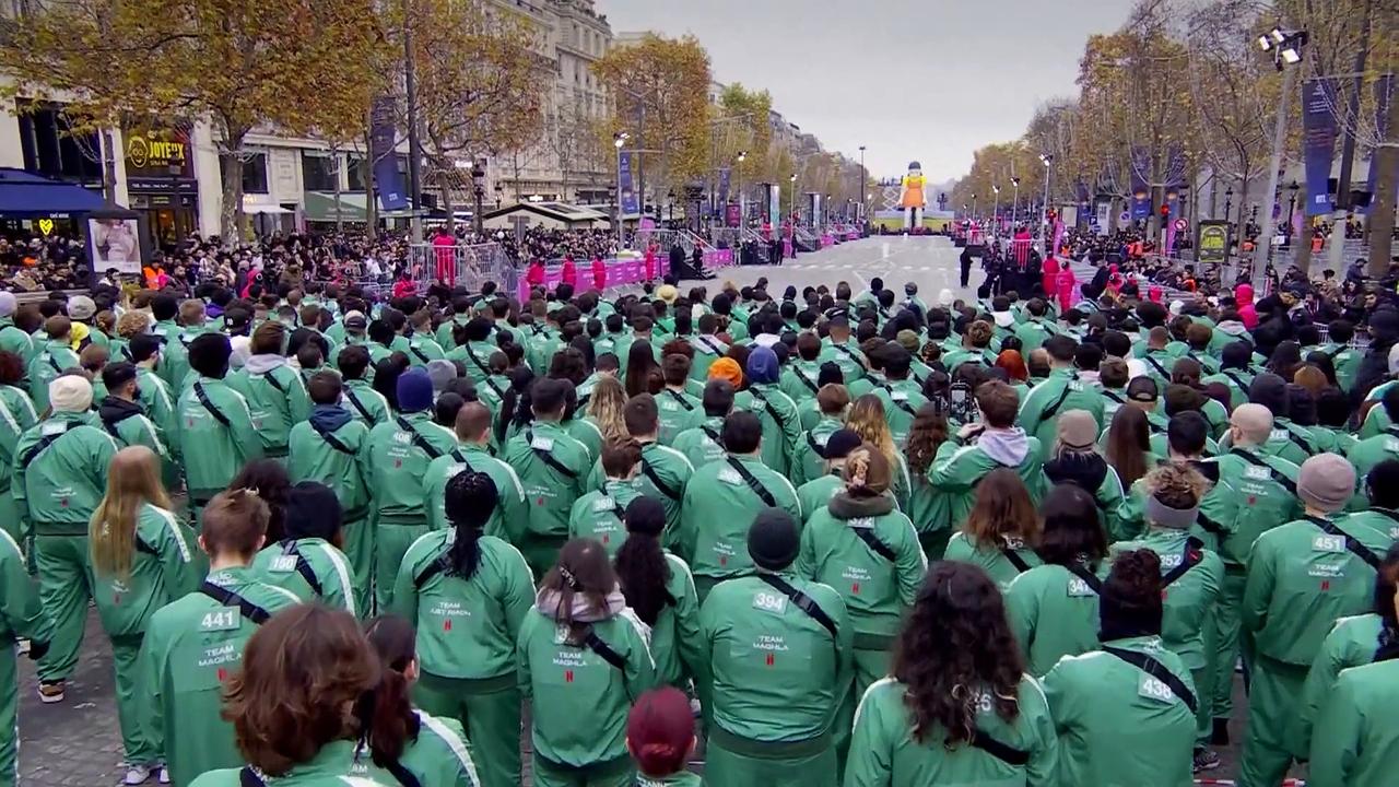 Squid Game fans bring 'Red Light, Green Light' to Paris's Champs-Elysées