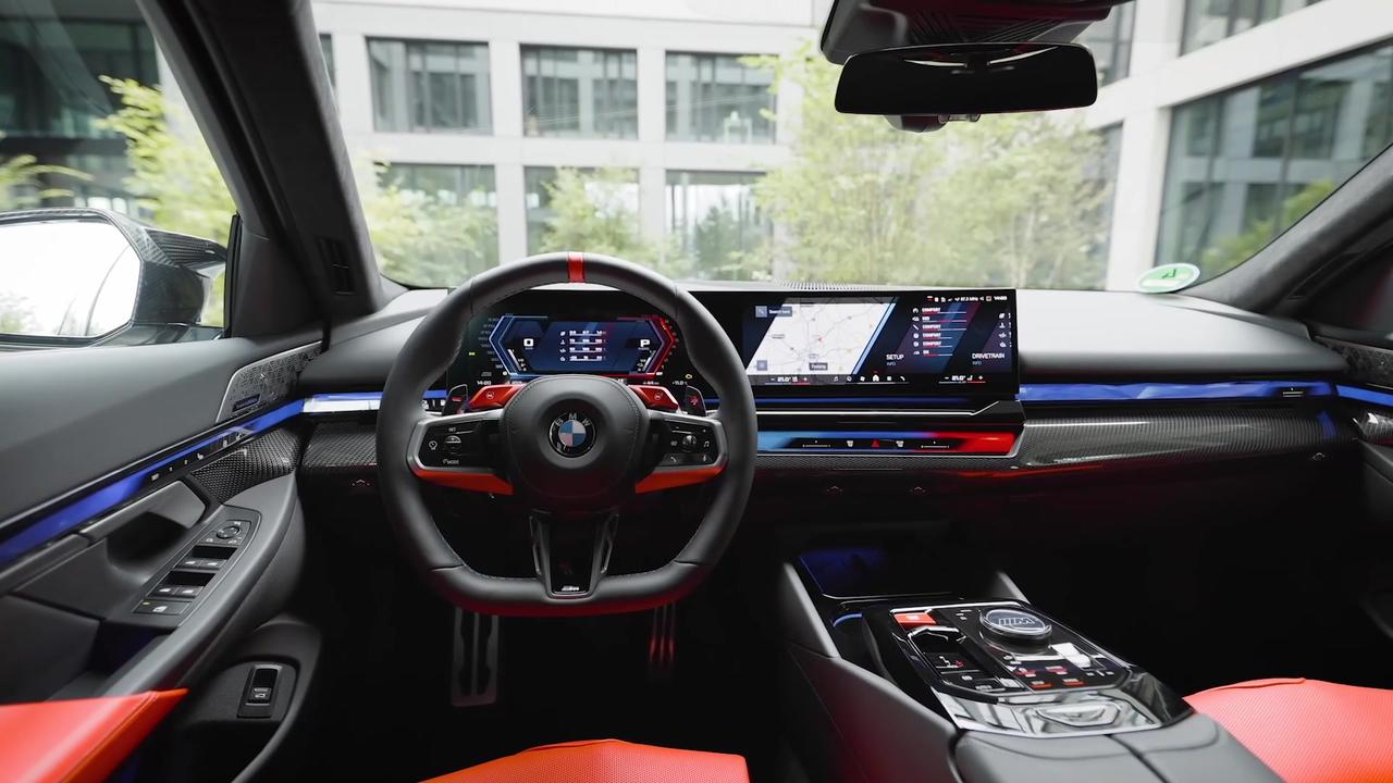 The all-new BMW M5 Touring Interior Design in Alpine White