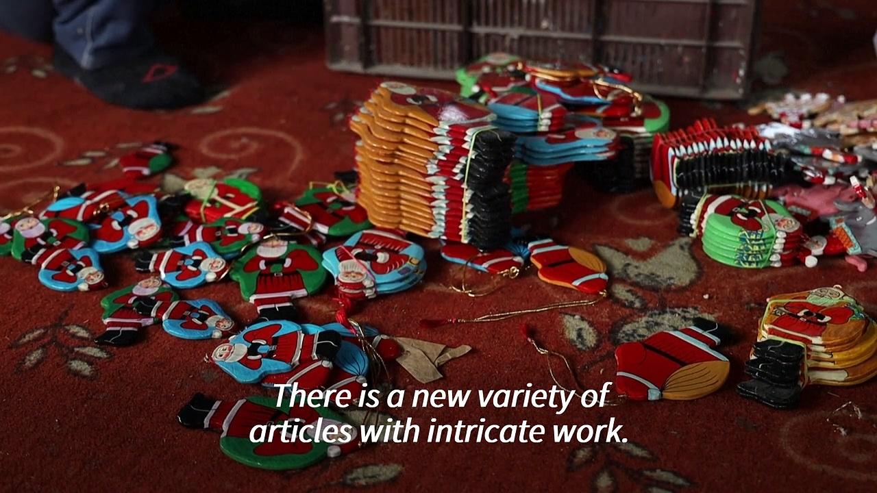 Kashmiri artisans craft unique papier mache Christmas decorations