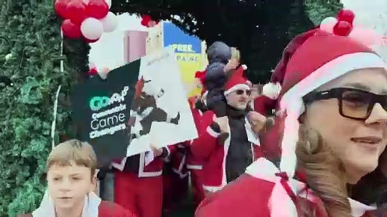 Thousands of Santas race through Kovoso city for charity marathon