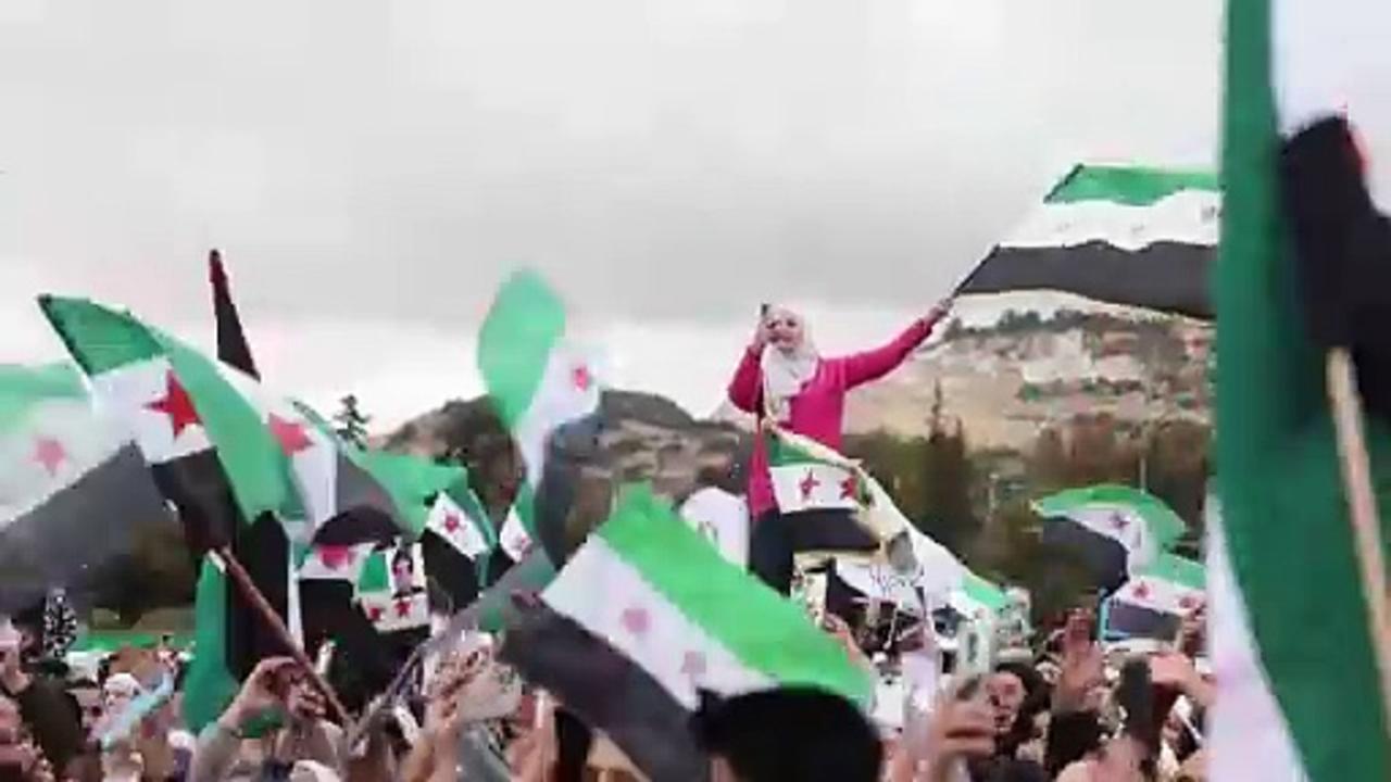 Syrians gather for military parade in central Damascus