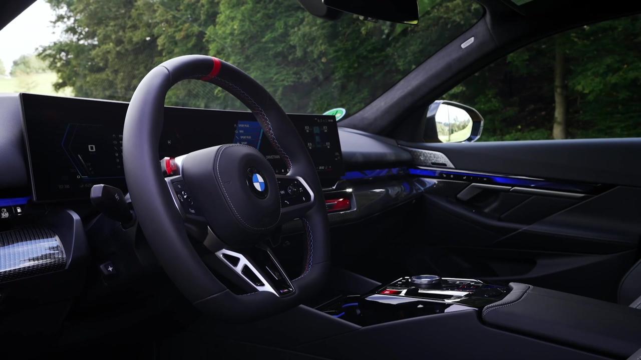 The all-new BMW M5 Touring Interior Design in Speed Yellow