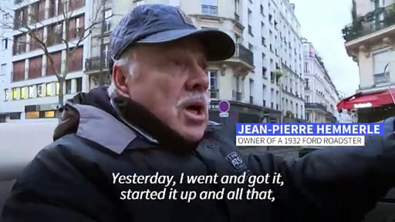 Vintage car enthusiasts take to the streets of Paris