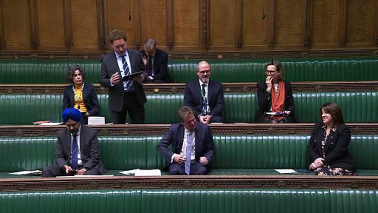 MP tries to shake off the giggles during Commons speech