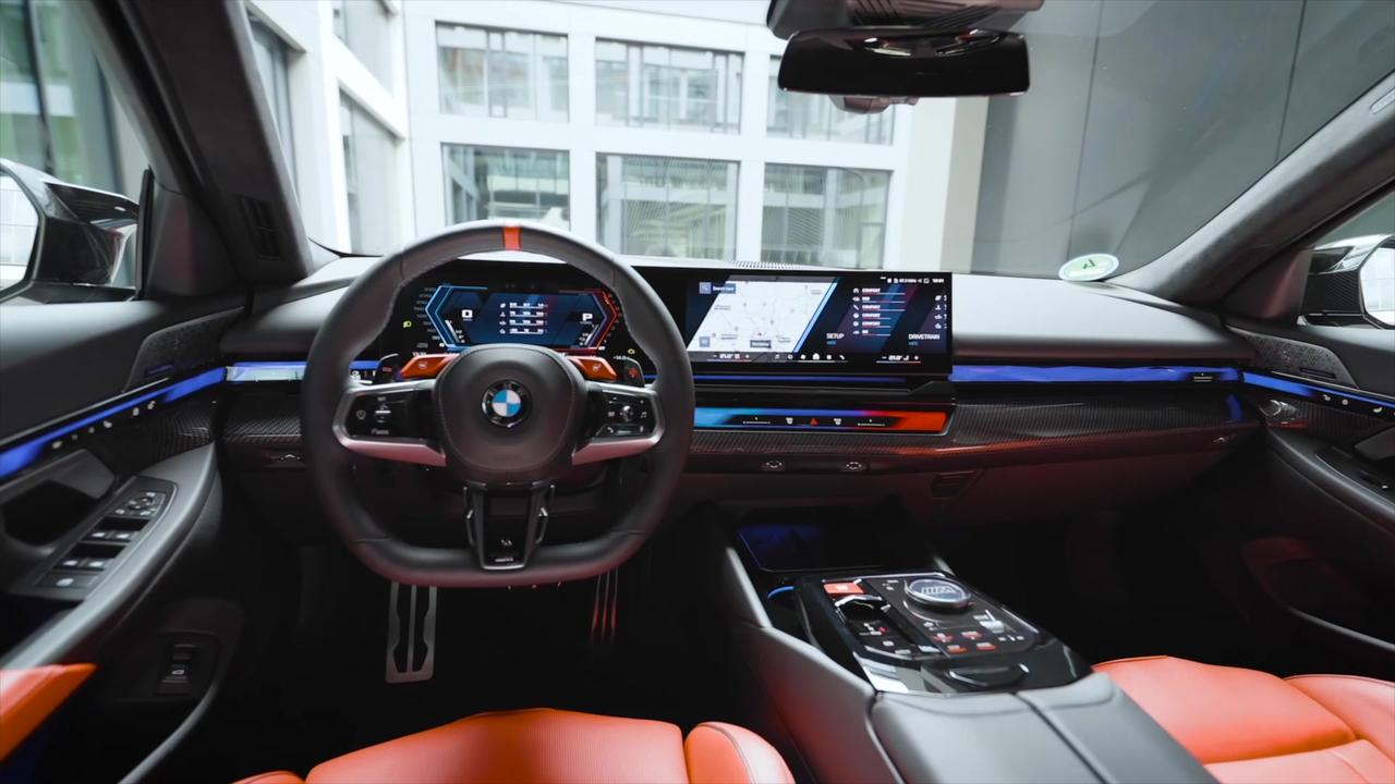 The all-new BMW M5 Touring Interior Design in Fire Red