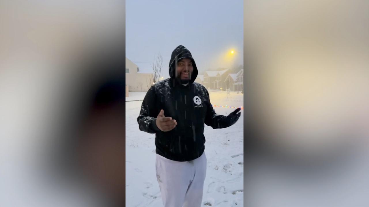 Florida Man Makes Snow Angel for the First Time After Rare Snowfall