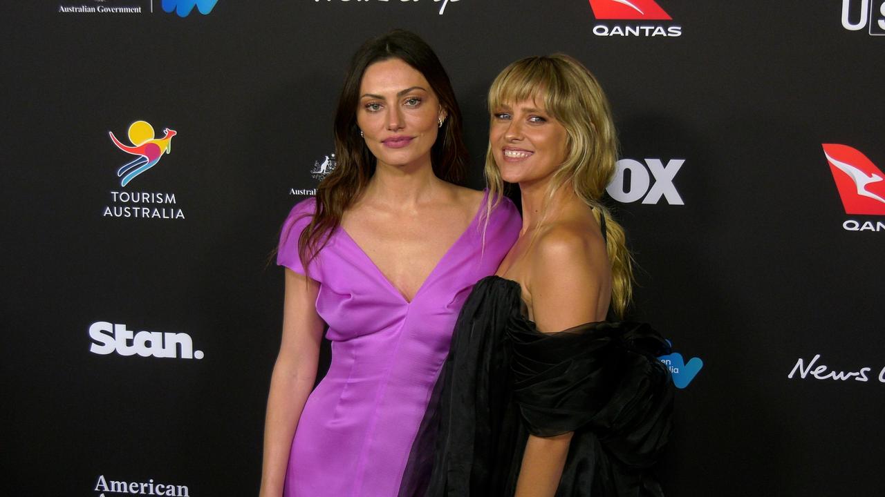 Phoebe Tonkin and Teresa Palmer attend the 22nd annual G'Day USA Arts Gala blue carpet event