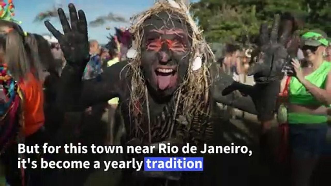 Covered in mud, Brazilians enjoy traditional carnival in Paraty