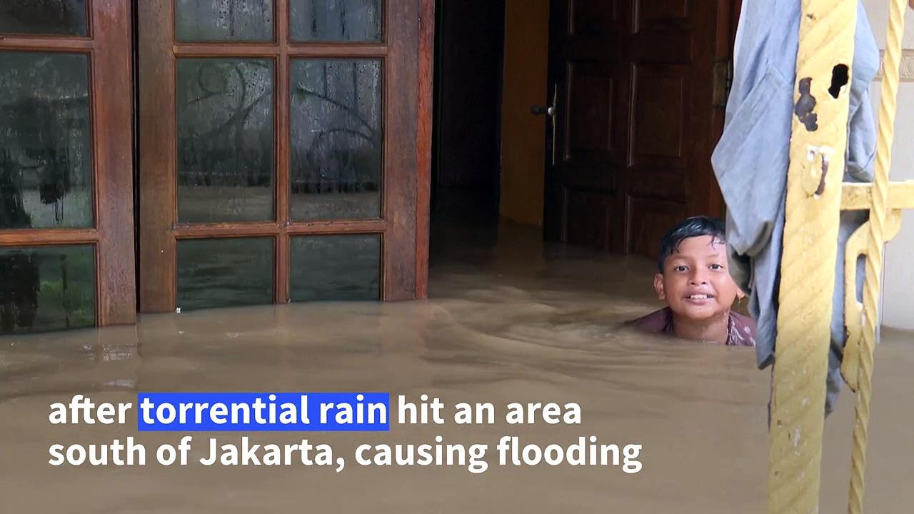 Flooding in Jakarta leaves submerged houses and chest-deep water