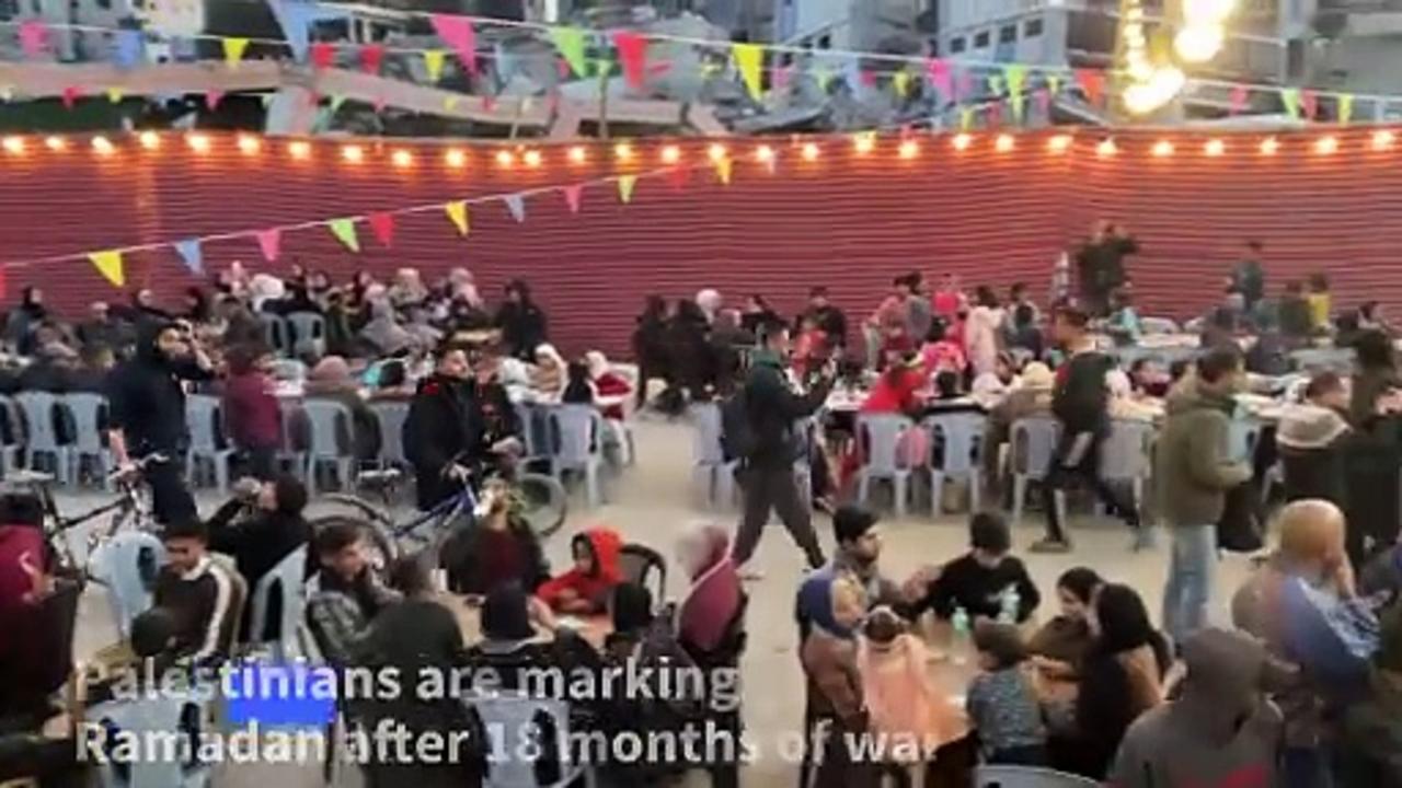 Palestinians break Ramadan fast amid the rubble in Gaza City