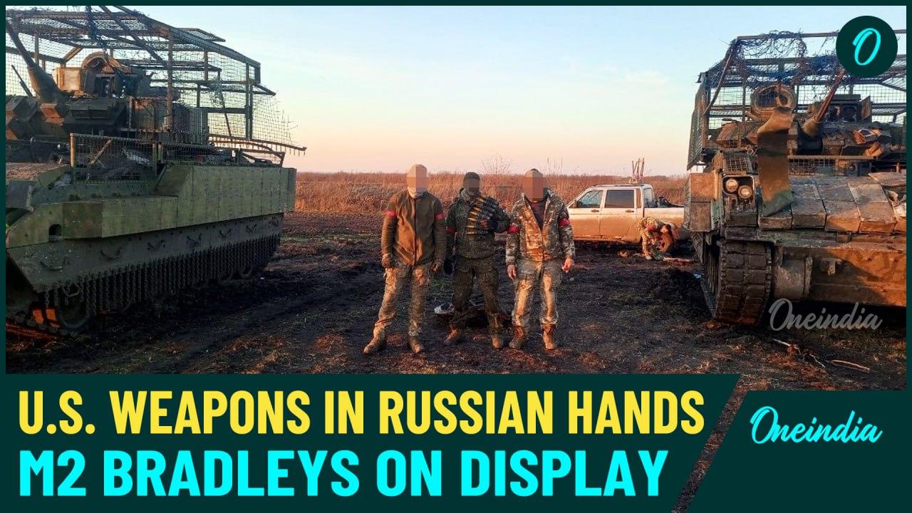 Russian Soldiers Pose Next to Captured US-made M2 Bradley Fighting Vehicles after Claiming Kursk