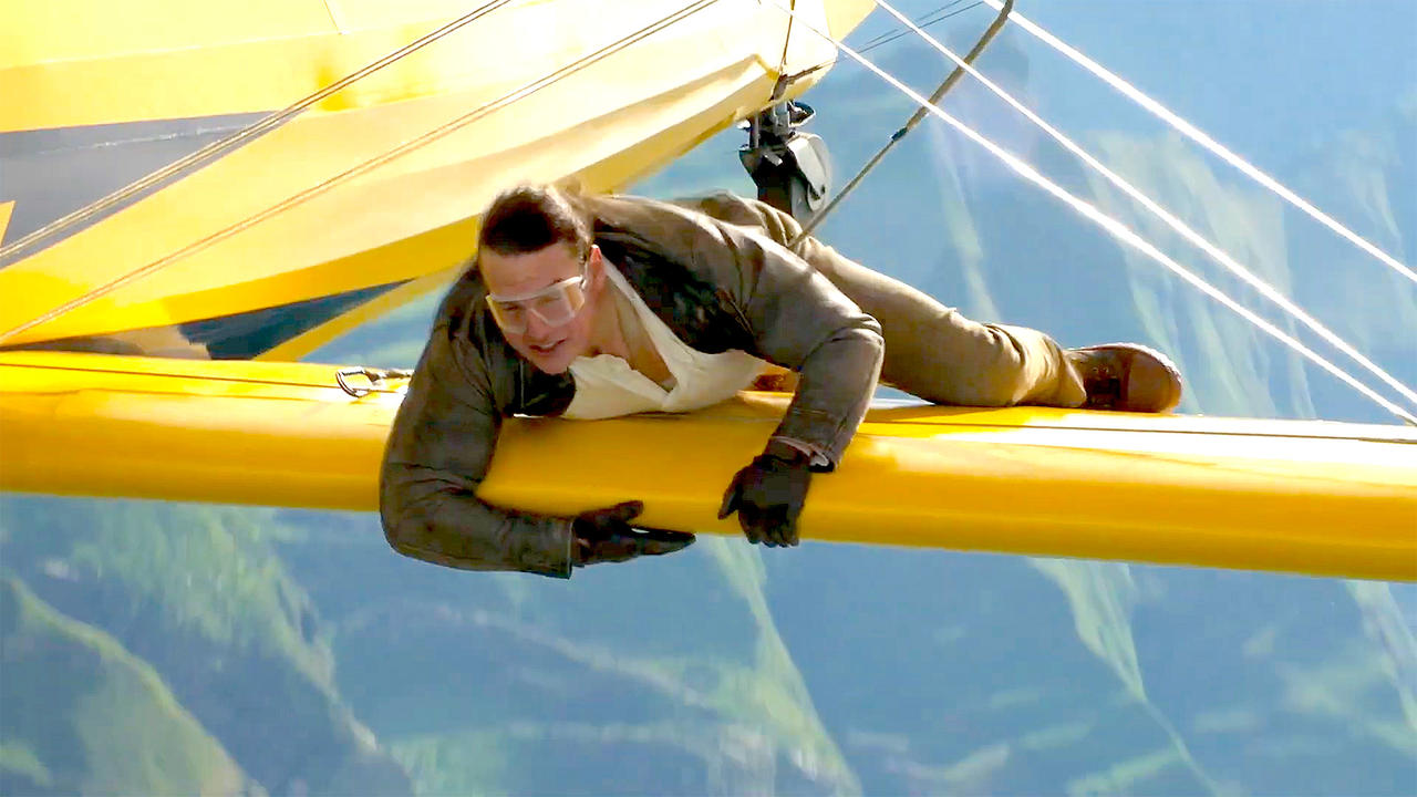 Tom Cruise Hangs From a Flying Plane—Because of Course He Does