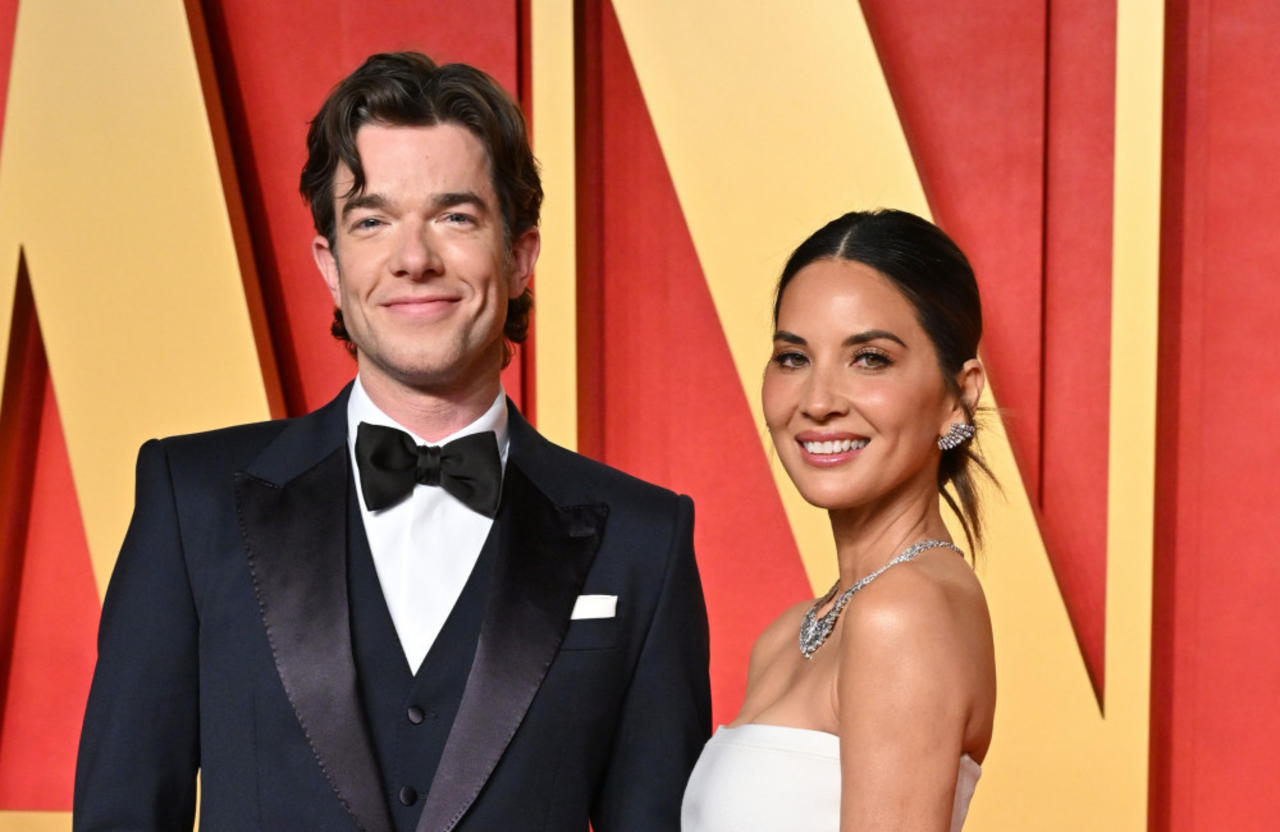 Olivia Munn and John Mulaney are finding it 'a little tough' to spend time together