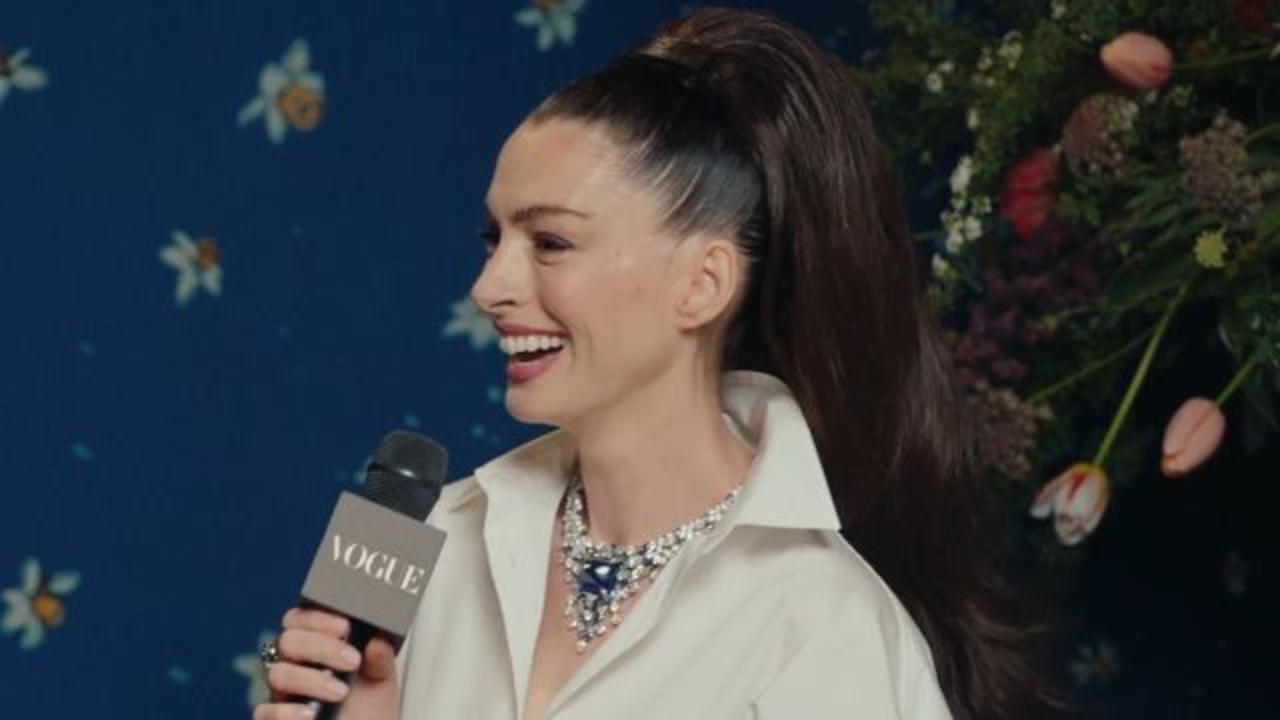 Anne Hathaway is Radiant in a Carolina Herrera White Shirt