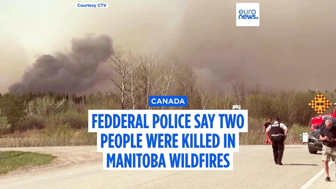 Police say two people were killed in massive wildfire in central Canadian province of Manitoba