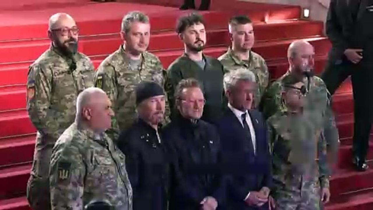 Bono brings Ukrainian soldiers onto red carpet at Cannes Film Festival