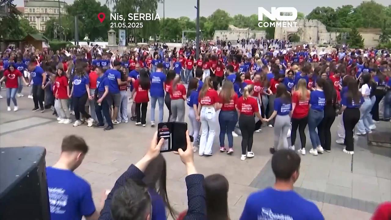 Graduates turn city squares into open-air dance floors