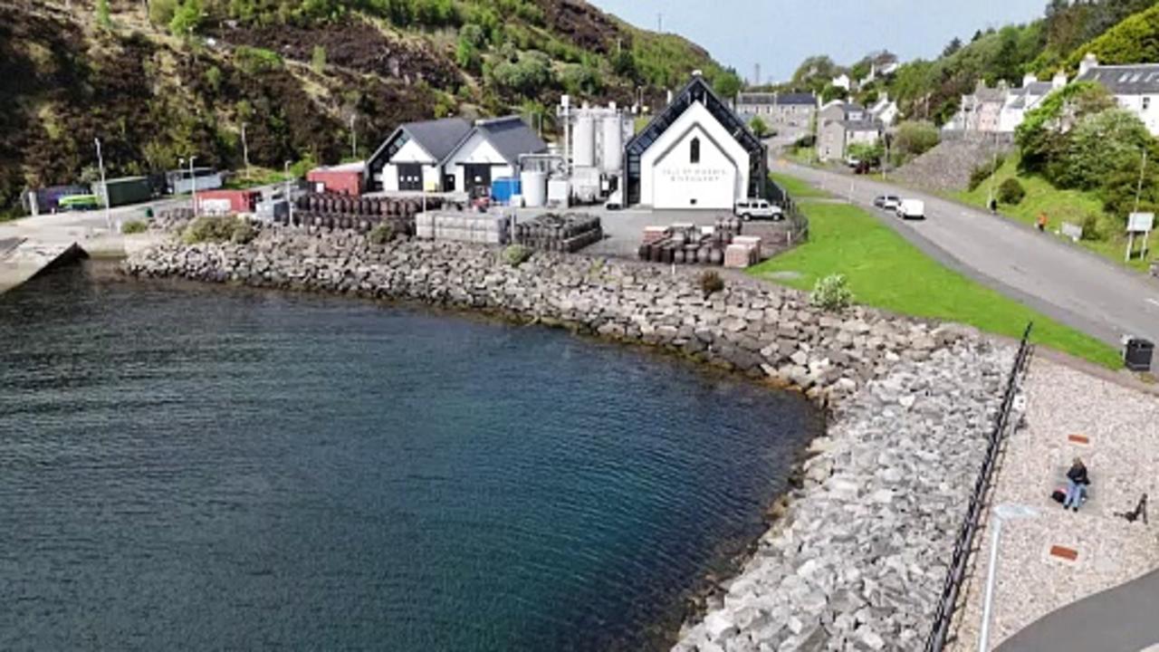 A dram and a dream: Scottish island distillery makes 'desperately sad' cuts