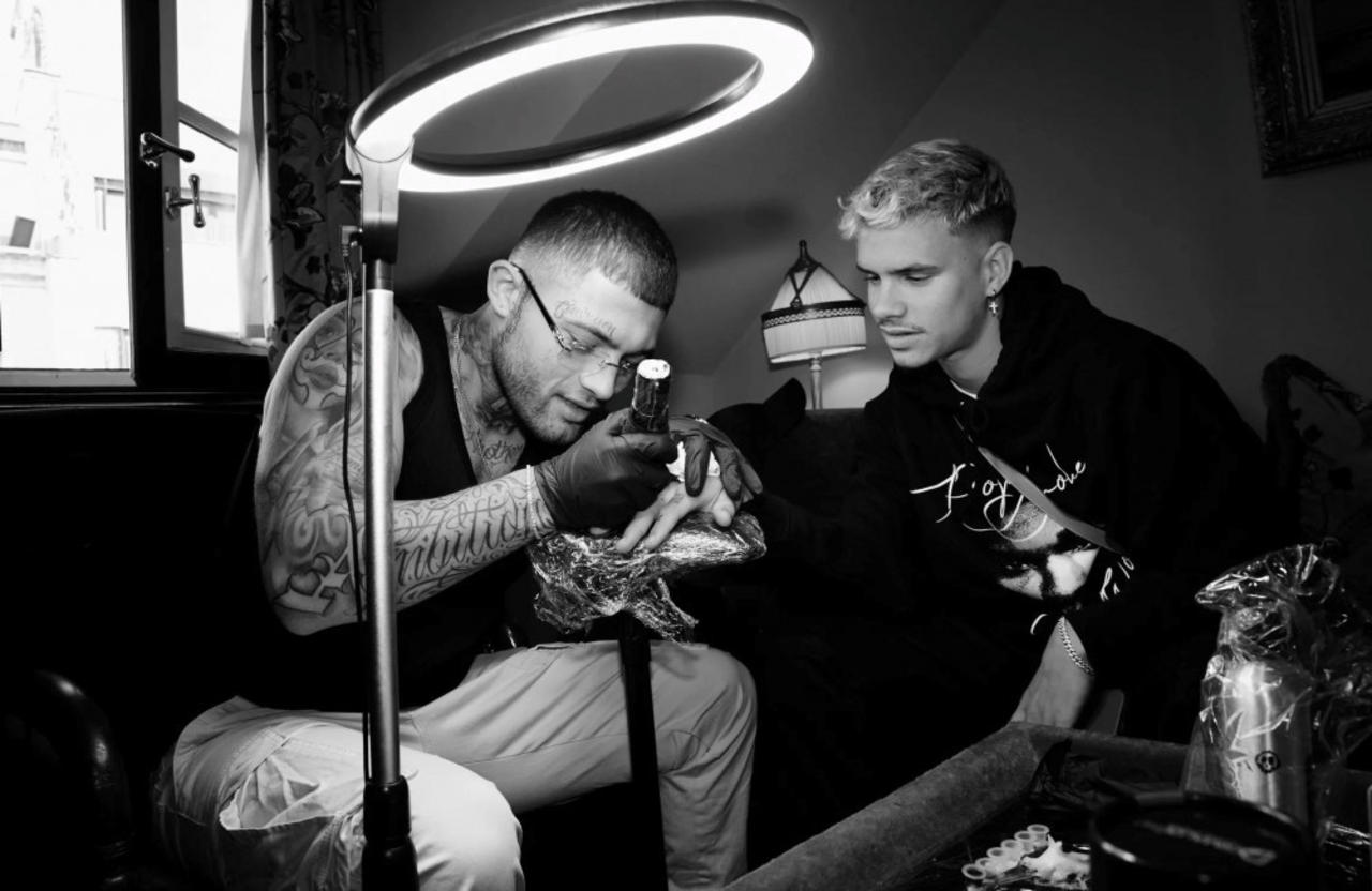Celebrity tattoo artist Certified Letter Boy teams up with Dave's Hot Chicken for opening of new Soho studio