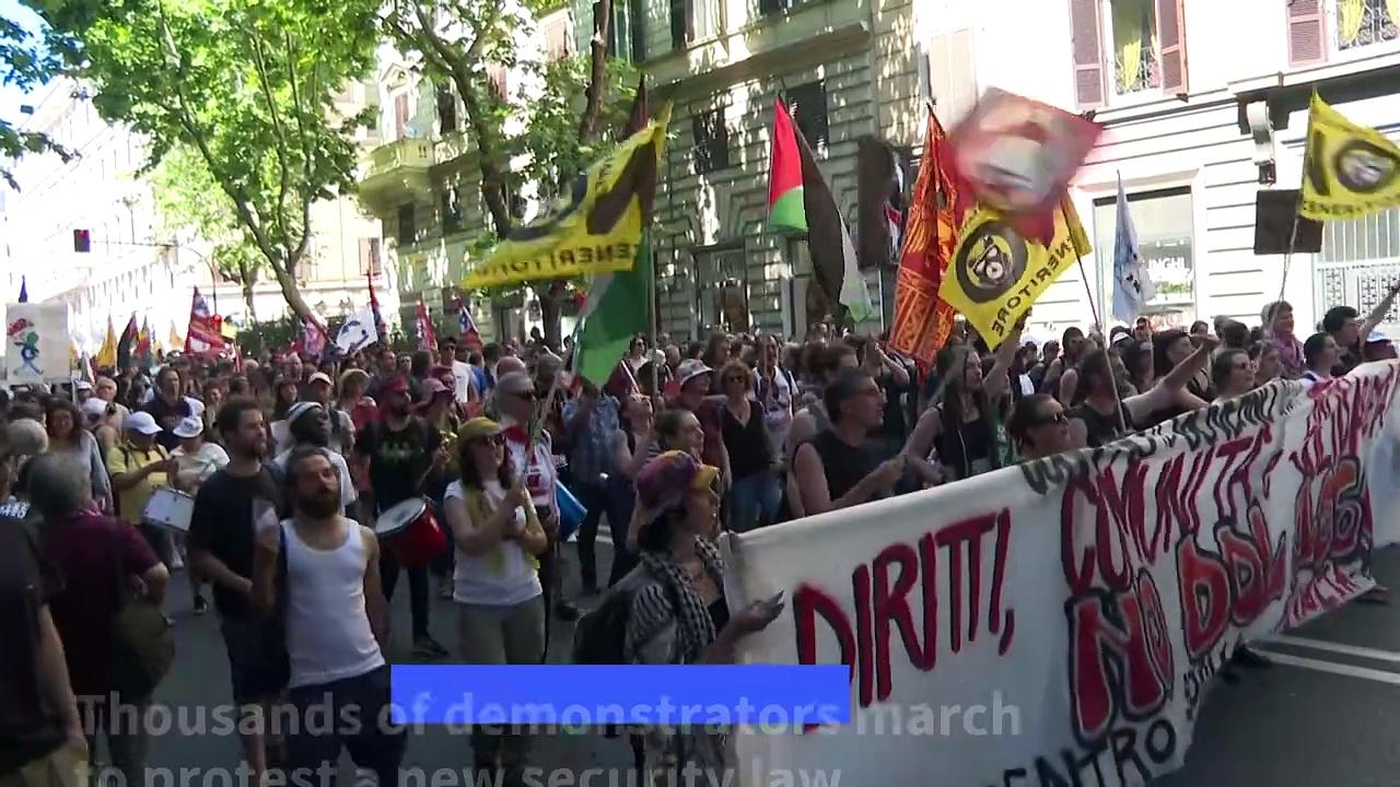 Thousands march in Rome against security clampdown law