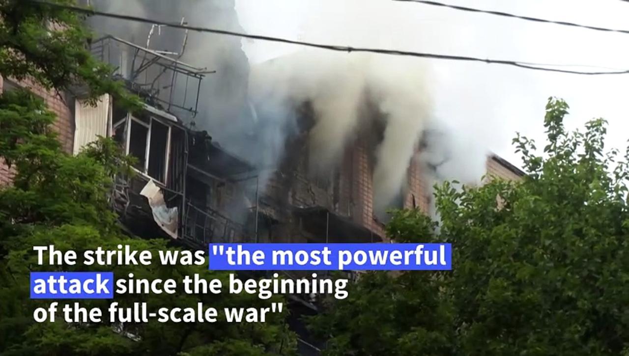 Firefighters tackle smouldering building after Kharkiv strike