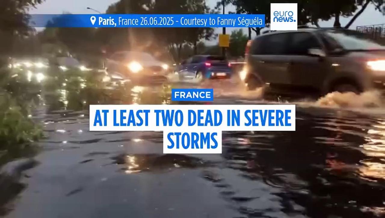 Two dead in French storms that flood streets and cause parliament roof to leak