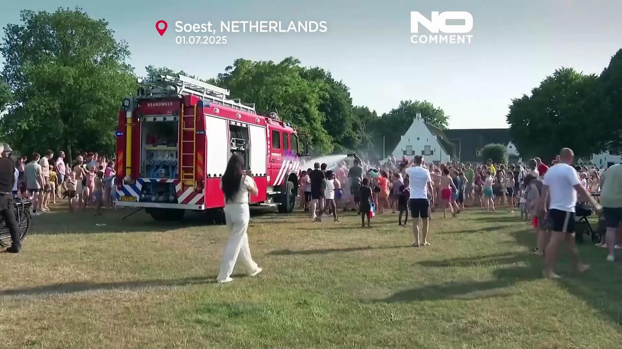 Dutch town cools down with firefighter-led water fight