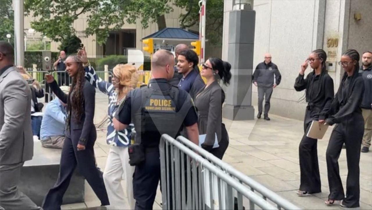 The Combs Family Exits Courts With A Smile And A Thumbs Up