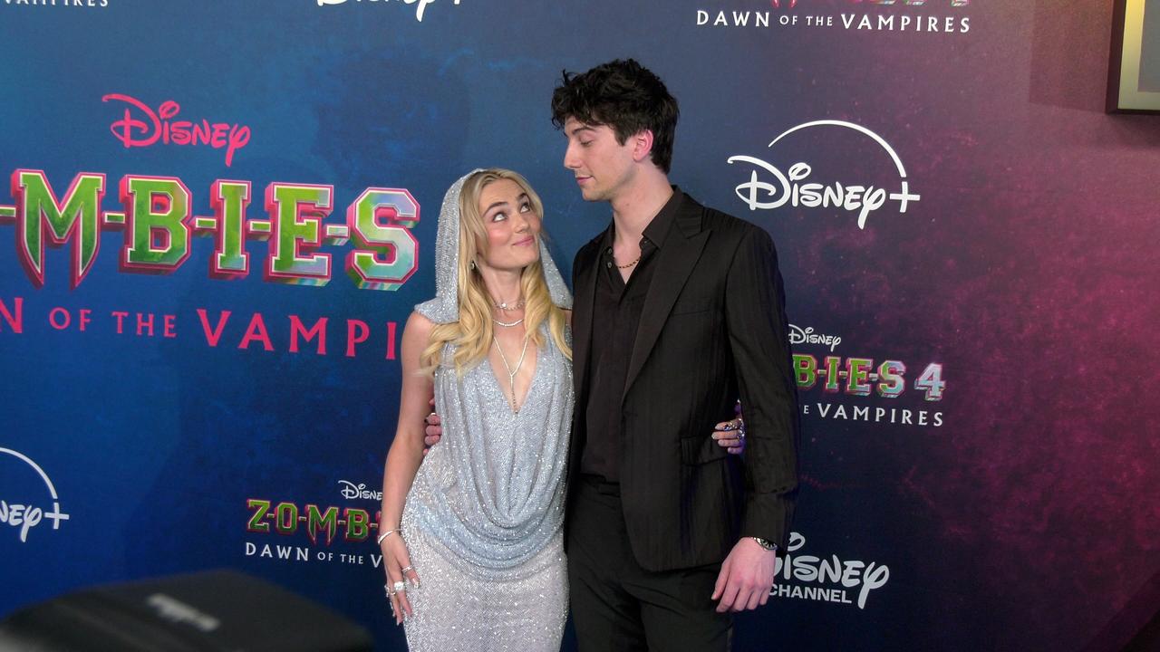 Meg Donnelly and Milo Manheim 'Zombies 4: Dawn of the Vampires' Premiere Blue Carpet
