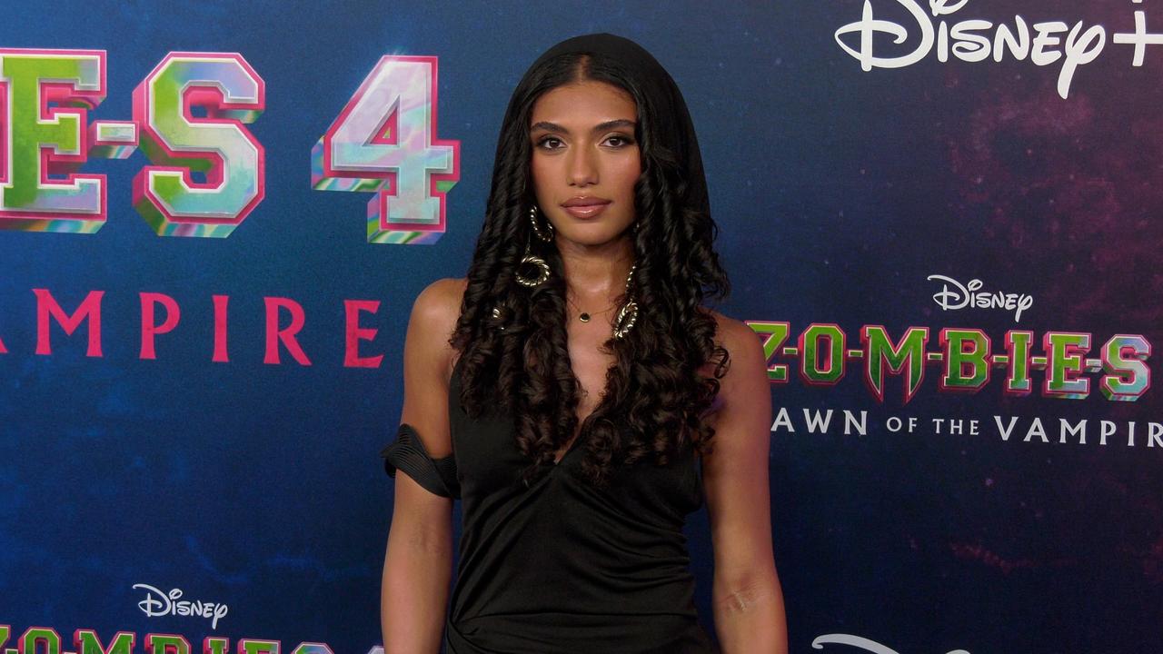 Dior Goodjohn 'Zombies 4: Dawn of the Vampires' Premiere Blue Carpet