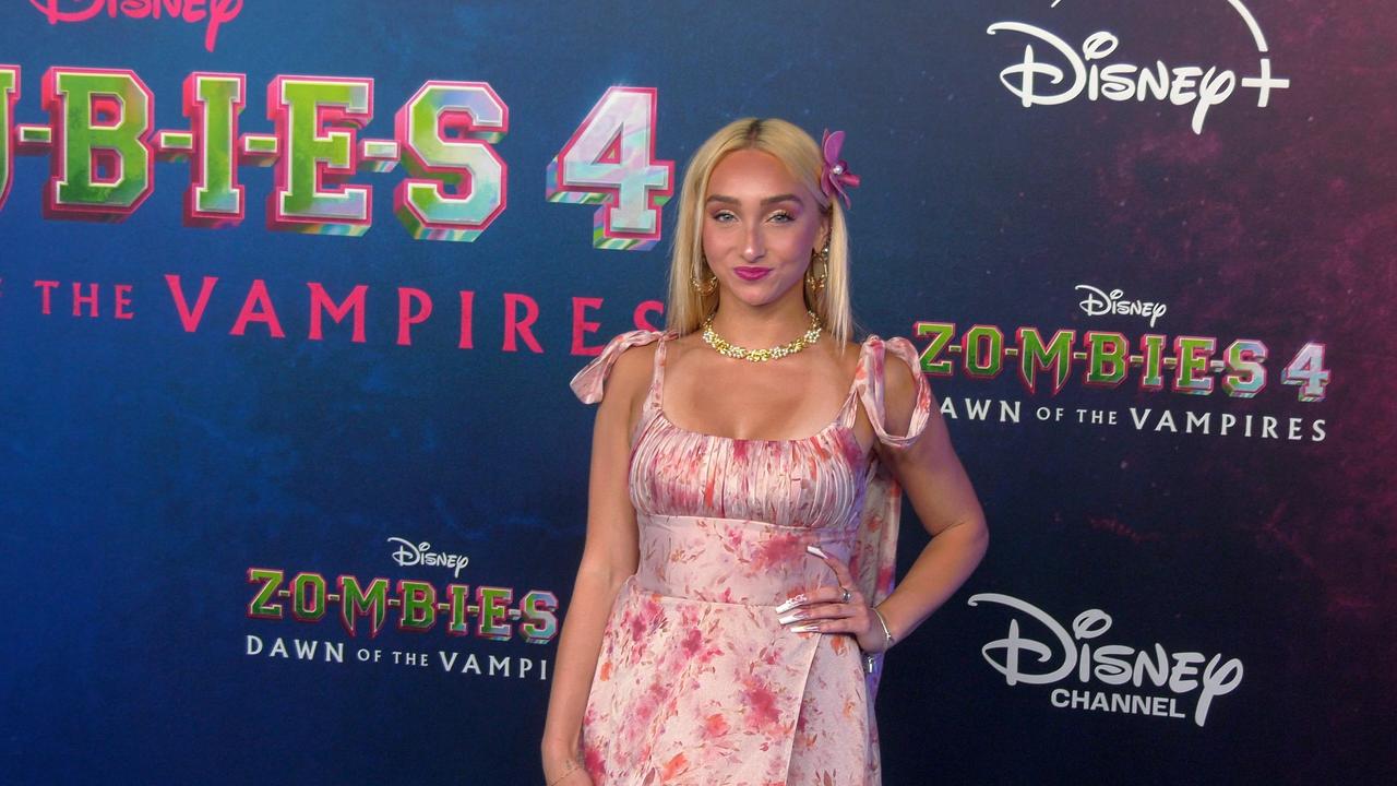 McKenzi Brooke 'Zombies 4: Dawn of the Vampires' Premiere Blue Carpet