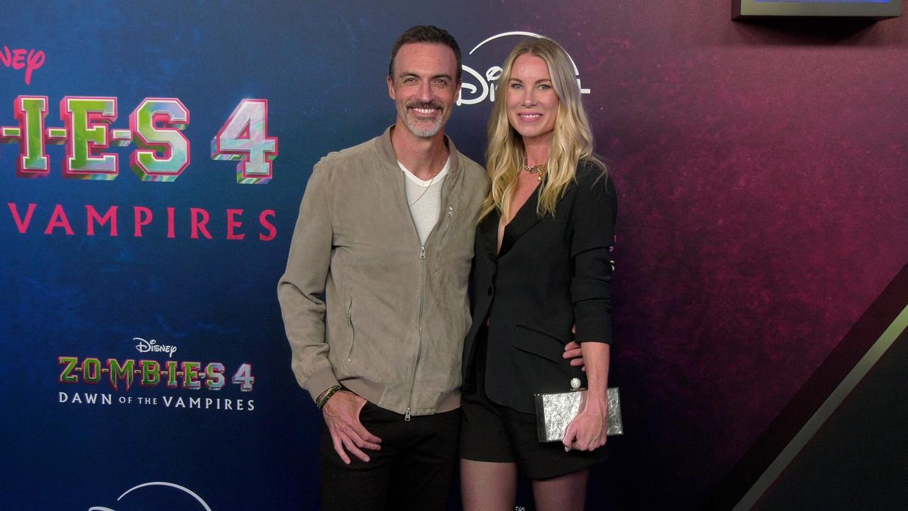 Reid Scott and Elspeth Keller 'Zombies 4: Dawn of the Vampires' Premiere Blue Carpet